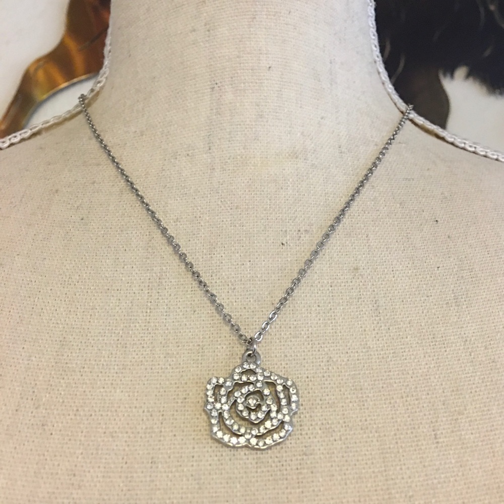 Clear rhinestone rose pendant on chain necklace